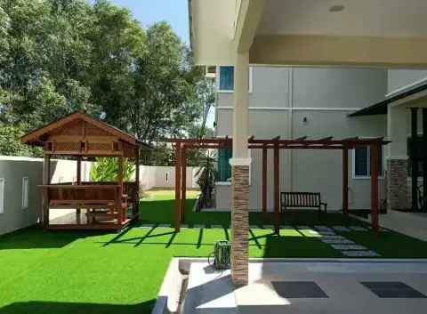 Timber gazebo and pergola in the garden, a RumahHQ client's home in Saujana Utama, Sungai Buloh